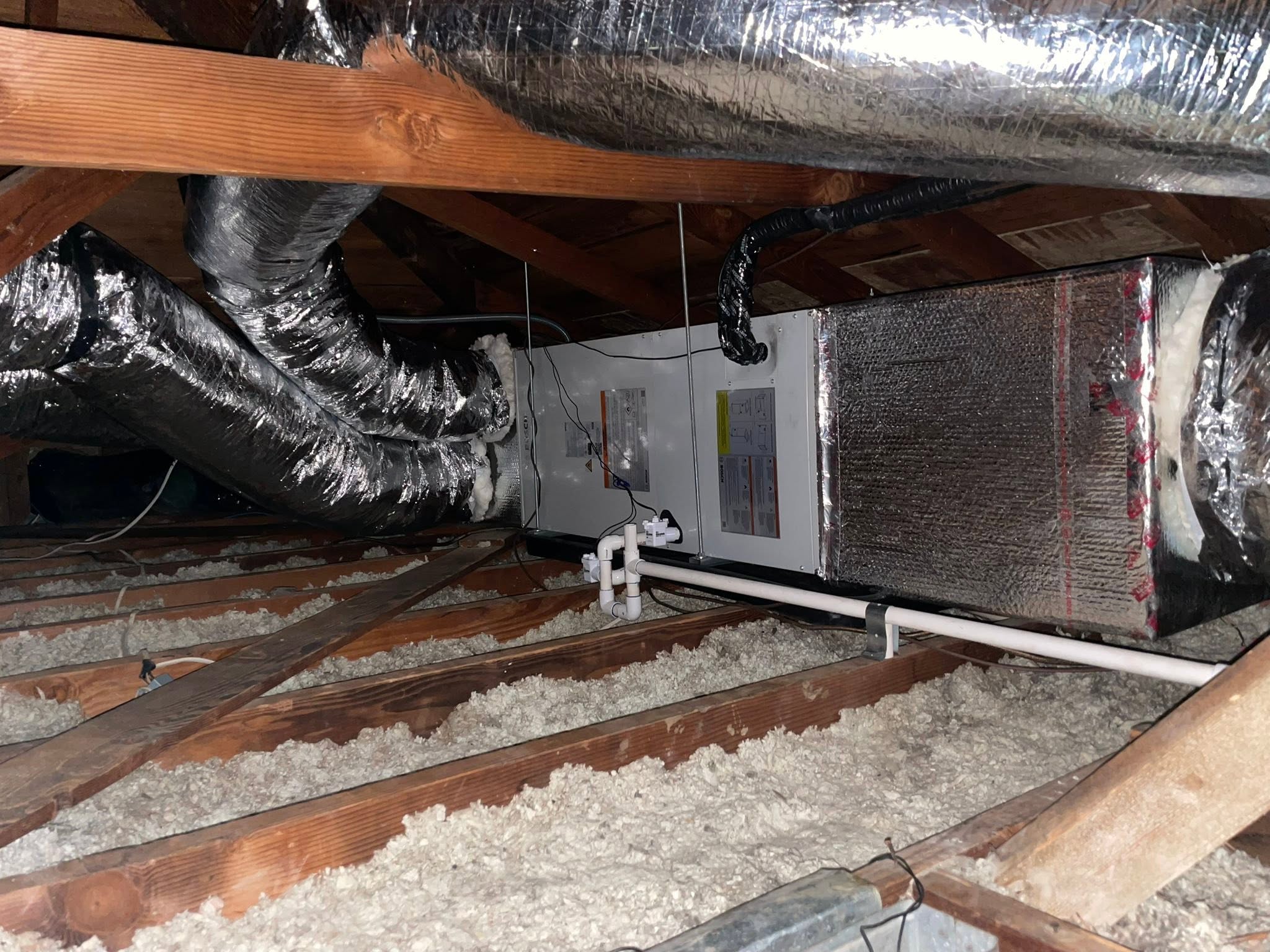 Attic air handler and insulated ductwork installation