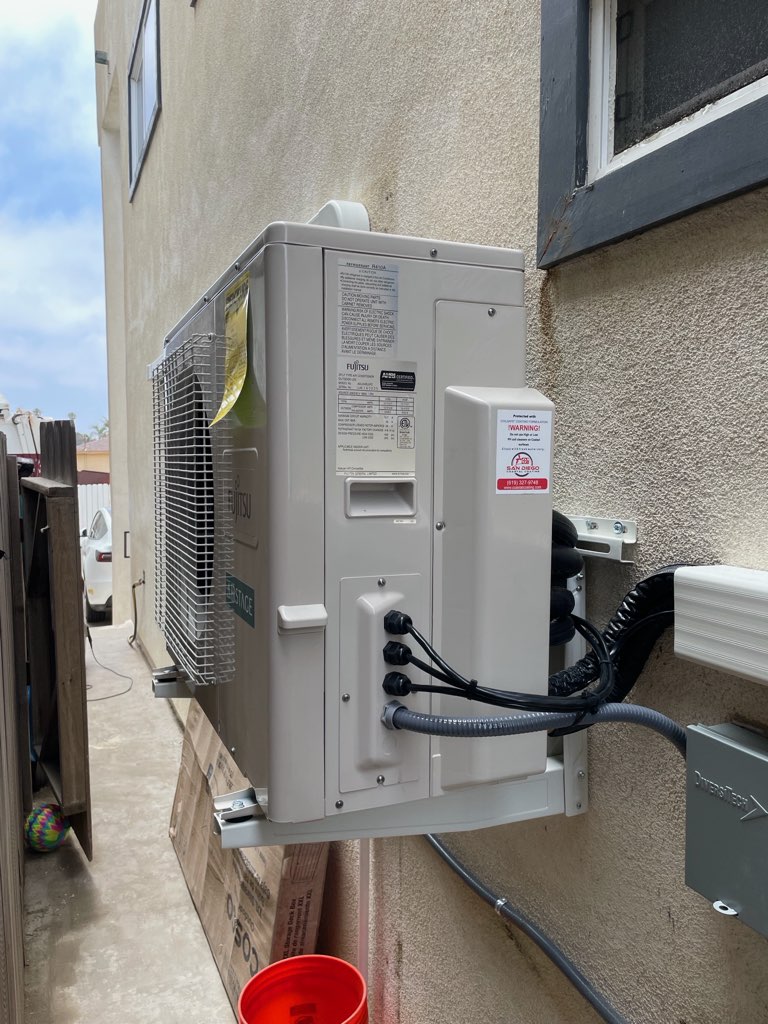 Fujitsu outdoor heat pump installed by First Class Climate