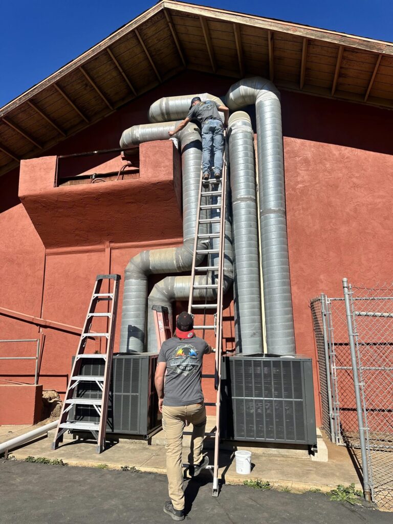 Insulated HVAC ductwork installed between attic framing